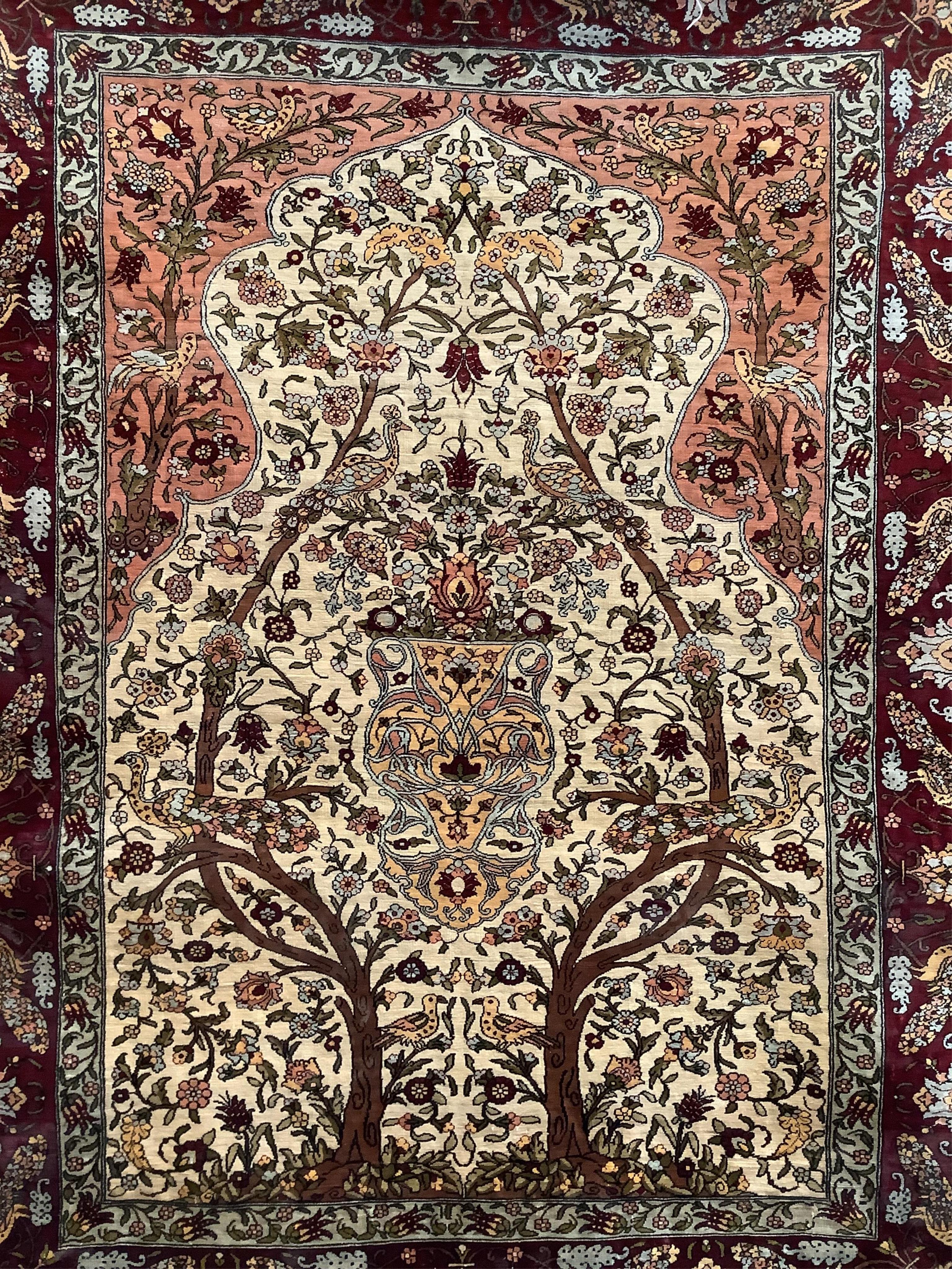 An Isfahan ivory ground part silk Tree of Life rug, 102 x 138cm. Condition - good